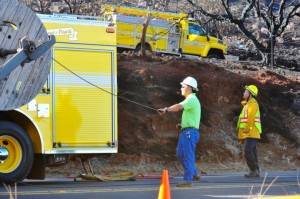 Hawaiian TelCom crews worked to restore phone service after the fire above Maalaea damaged fiber used to serve the West Maui area. Photo Courtesy County of Maui.