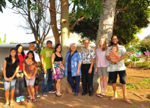 Maui Mayor Charmaine Tavares & Council Vice-Chair Michael Molina visited with several families who recently purchased their own home under the FTHBG program.  L-R: Manny Visitacion and daughters Tiffany (13), Ashley (16) and Seryna (10); siblings Rudolfo Queja & Irene Queja Bala; Mayor Tavares; Councilmember Molina; Joy & Charles Au with son Makahinu, 14 mos. Photo Courtesy County of Maui.