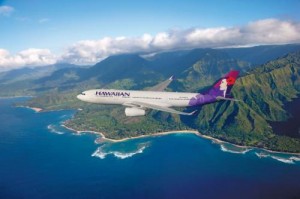 Hawaiian Airlines newest aircraft, the 294-seat Airbus A330-200, is seen flying above beautiful Hawaii. Hawaiian is launching daily, nonstop flights between Honolulu and Osaka, Japan, this July. Osaka will be the third Asia destination that Hawaiian has launched service to in recent months, following Seoul in January and Tokyo last November. (PRNewsFoto/Hawaiian Airlines, Chad Slattery) 