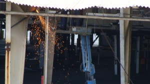 Crews worked to remove portions of the old Kahului cannery roof.