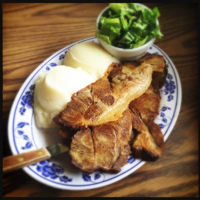 The roast pork. Trust us and skip the mashed potatoes. Photo by Vanessa Wolf