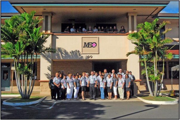 Staff stand outside the MEO building in Wailuku. Courtesy file photo.