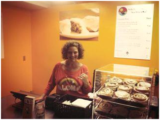 Victoria Briggs, owner of No Ka 'Oi Cinnamon rolls at Whalers Village on store on opening day.Courtesy photo.