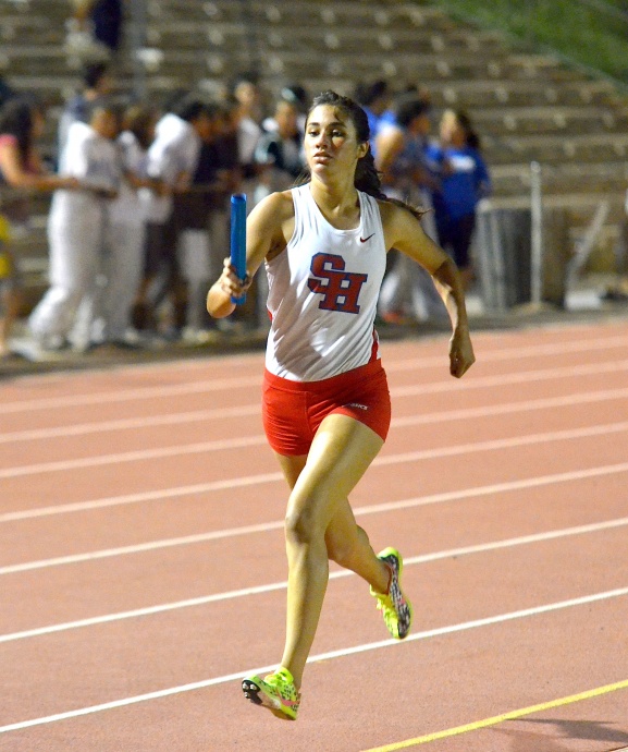 Seabury Hall's Kiana Smith in the girls 4x400 relay that was disqualified Saturday after unofficially breaking the meet record. Photo by Rodney S. Yap.