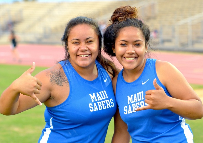 Maui High School's Cherish Taiseni (left) and Grace Fisher won the girls shot put and discus, respectively. Taiseni had a throw of 32-0.5 inches and Fisher won the discus in 90-10. Photo by Rpdney S. Yap.