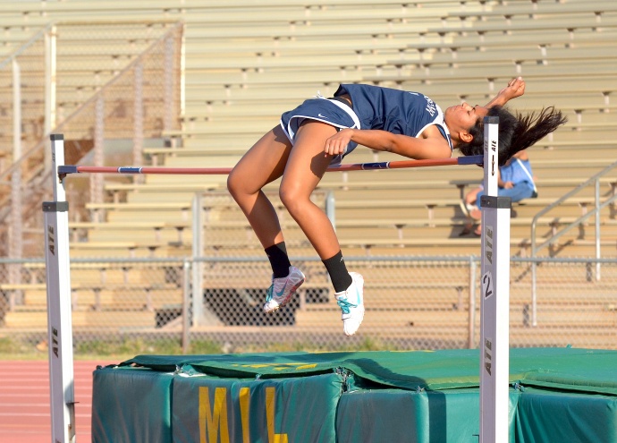 Kamehameha Maui's Raven Poepoe clears 5 feet, 2 inches in the girls high jump. Photo by Rodney S. Yap.