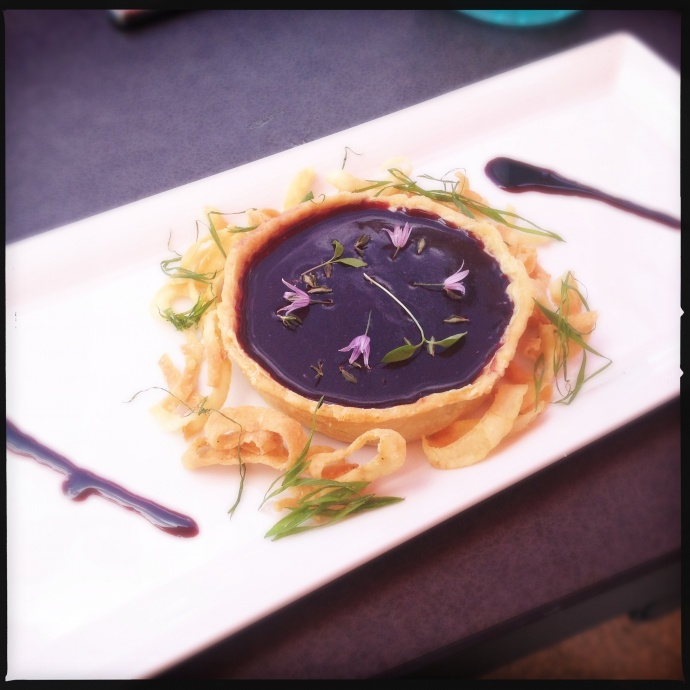 Wesley Holder's Maui onion tart with foie gras mousse and port wine gelee. Photo by Vanessa Wolf