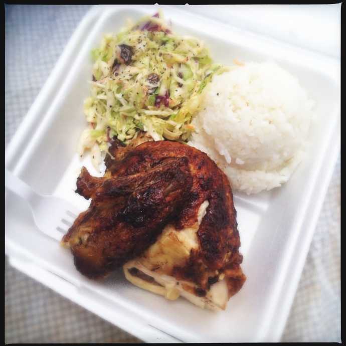 The 1/4 chicken with rice and cole slaw. Photo by Vanessa Wolf