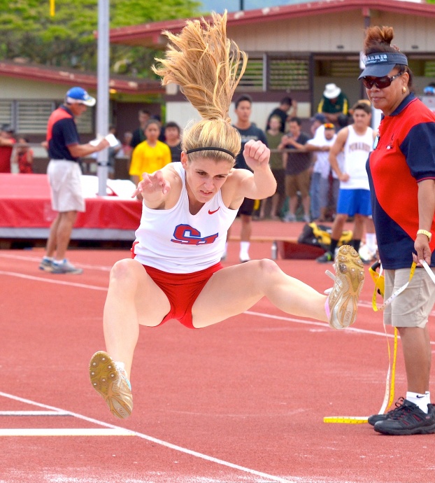Seabury Hall's Alyssa Bettendorf was busy running the 100 (3rd), 200 (3rd), 400 (2nd) and jumping. The Spartan junior placed third in the long jump at 16 feet, 7 inches. Photo by Rodney S. Yap. 