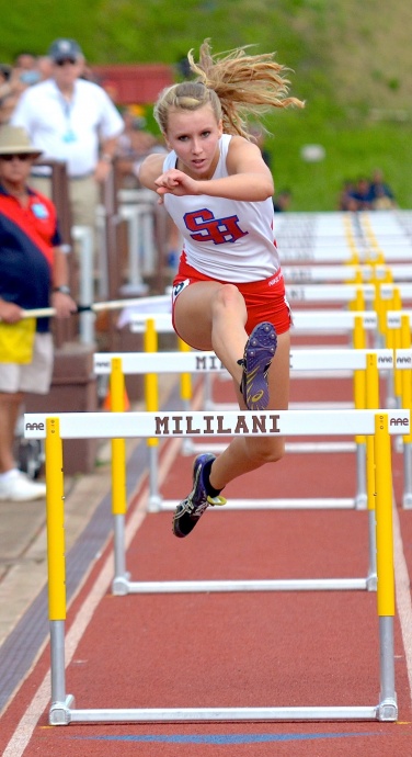 Seabury Hall's Christy Fell in the 100-meter high hurdles Saturday. Photo by Rodney S. Yap.