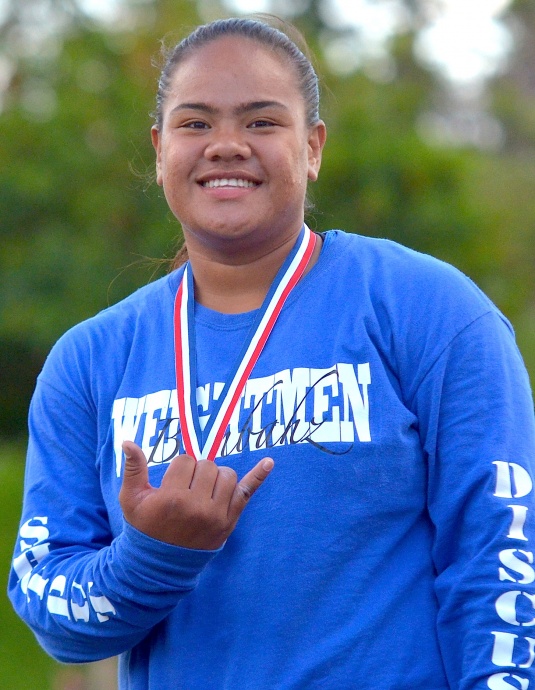 Maui High's Christina Lotulelei won the girls discus (139-02) and finished second in the shot put (40-11.5) with personal bests in both events. Photo by Rodney S. Yap.