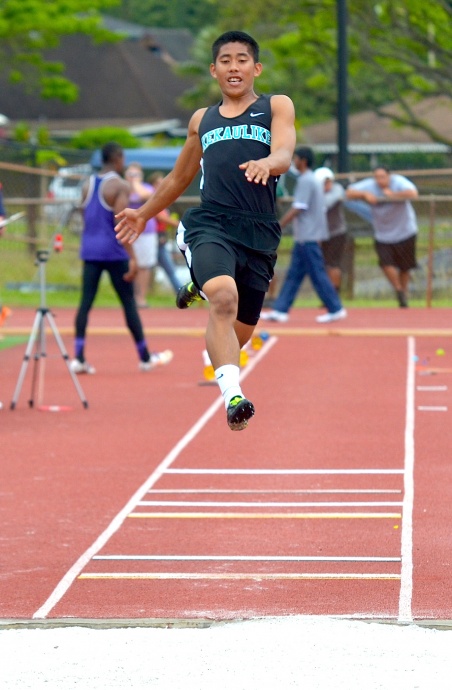 Jansen Agapay of King Kekaulike won the boys long jump in 22 feet, 11.25 inches, and he finished fourth in the triple jump in 44-01. Photo by Rodney S. Yap.