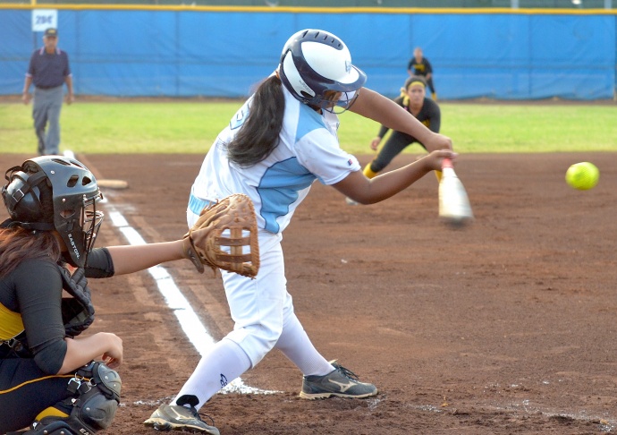 Saint Francis Rachel Carlos gets on base via a fielding error at shortstop following this hit in the first inning Friday. Photo by Rodney S. Yap.