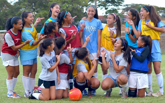 Ilihia Keawekane (middle) is the center of attention on the '00 Pono SC after becoming Maui's first female soccer player to be invited to train with the U14 United States Women's National Soccer Team. Front Row (left to right), Breanne Mukai, Tehani Moikeha, Darian Fernandez, Shayna Yoshida, Kaeana Anguay. Second row (left to right), Tihanee Freitas, Mikayla Barut, Makamae Aquino, Chai Cortez, Ilihia Keawekane, Kamalei Roback, Kainoa Dafun, Leialoha Medeiros and Kylee Yamashita (back). Photo by Rodney S. Yap. 