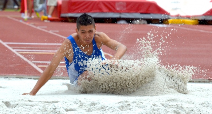 Maui High's Raymond Ledesma placed fourth in the boys long jump at 21 feet, .75 inches. Photo by Rodney S. Yap.