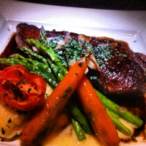 The NY Steak and those inexplicably tasty carrots. Photo by Vanessa Wolf