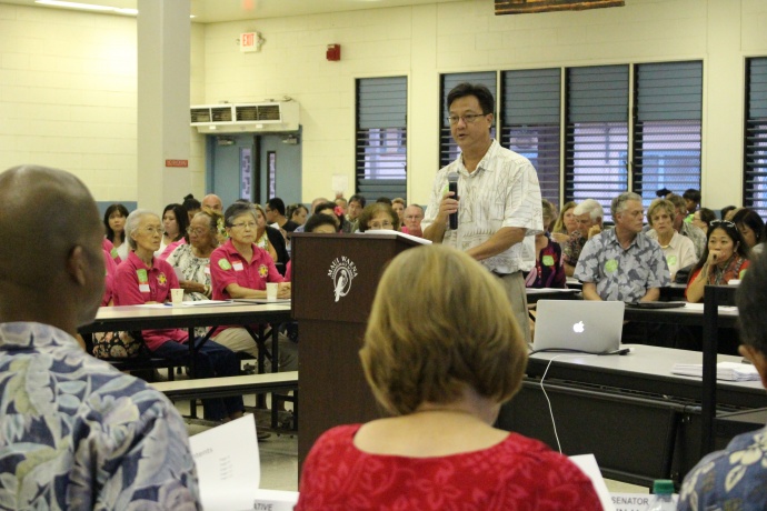 HHSC Maui District executive Wesley Lo testifies before the legislative hearing on the state's public health system budget shortfalls.  Photo 11/10/14 by Wendy Osher.