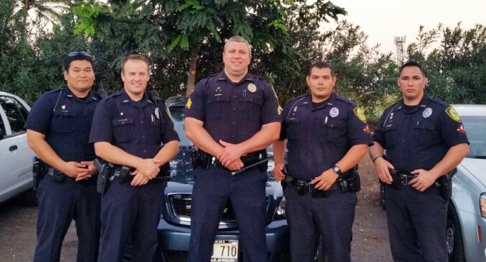 Pictured from left to right: Officer Alvin OTA, Officer Ryan EHLERS, Sergeant Nick KRAU, Officer Carl EGUIA, and Officer Rusty IOKIA.  Photo courtesy the Maui Police Department.
