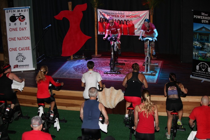 Spinning Nation fundraising event for the American Heart Association's Go Red For Women movement.  Photo by Kevin J. Olson.