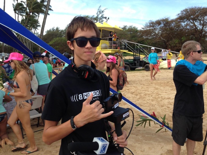 YBEAM graduate Colin McGee on location at Baldwin Beach Park for the Maui Butterfly SUP Event. Photo credit: YBEAM.