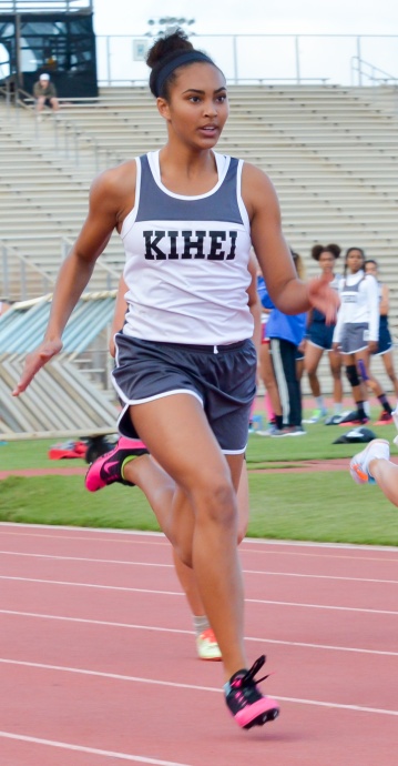 Kihei Charter's Maya Reynolds finished first in her heat of the girls varsity 100-meter dash. Reynolds was timed in 13.15 seconds. Photo by Rodney S. Yap.