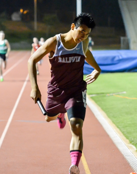 Baldwin's Bailey Kaopuiki won the boys 100 and 200, and anchored both the Bears' 4 x 100 and 4 x 400 relay teams in Saturday's finals of the Yamamoto Invitational. Photo by Rodney S. Yap.