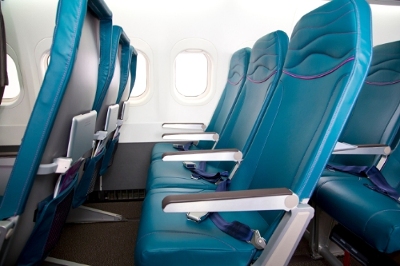 Hawaiian Airlines announced completion of a comprehensive retrofit on the first of its 18 Boeing 717 aircraft, featuring an island-inspired interior cabin redesign and new lightweight Main Cabin seating. (PRNewsFoto/Hawaiian Airlines)