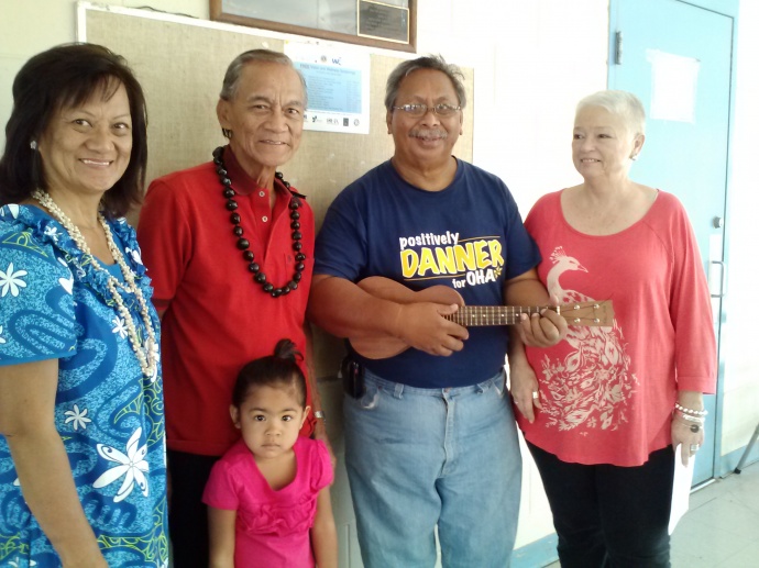 Preparing for Saturday’s 26th annual Prince Kuhio Day Ho‘olaule‘a are event chairwoman Velma Mariano (from left), Paukukalo resident Ernest Valle, his 3-year-old granddaughter Challyse-Fe Valle, Matthew Kailihou, and Anne Chipchase of event participant Project Vision Hawai‘i. 