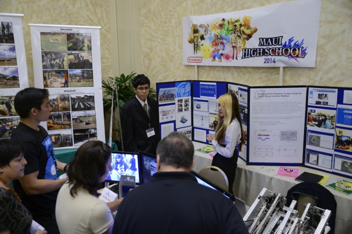 Preston Rodrigues Masago and Anna Maiwa of Maui High School gave their Project Impact Assessment presentation to the judges during the 2014 Hawaii STEM Conference.