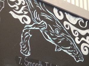 Artwork on the beer board at Koholā, which means whale in Hawaiian. The microbrewery opened in Lahaina in December 2015. Photo by Kiaora Bohlool.