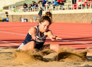 Kamehameha Maui's Quinn Williams lands into the girls long-jump pit safely. Photo ny Rodney S. Yap.