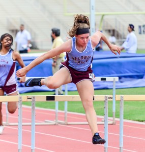 Baldwin's Kaitlin Smith set a new meet record in the girls 100 hurdles Saturday. Photo by Rodney S. Yap.