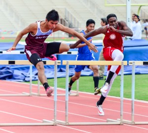 Baldwin's Kiernan Leighton Mateo wins the boys 110 high hurdles with a new personal best time of 14.71 seconds. Photo by Rodney S. Yap.