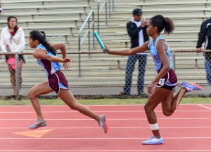 Baldwin's winning 4 x 100 relay execute the first handoff Saturday. Photo by Rodney S. Yap.