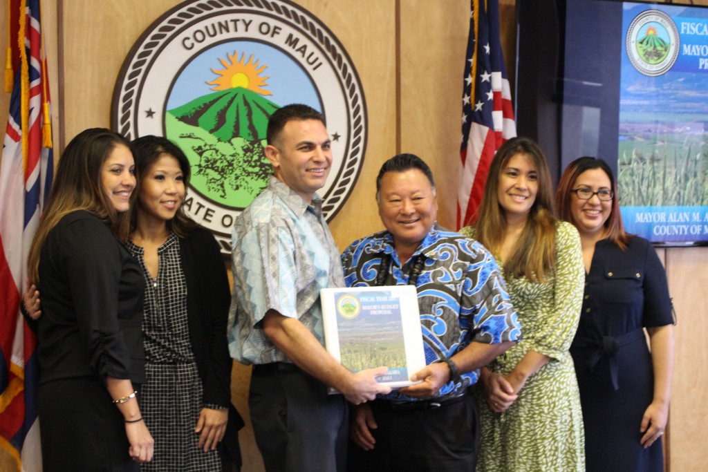 The Maui County budget team stands with Mayor Alan Arakawa as they present the Fiscal Year 2017 budget to the Maui County Council. Photo (3.24.16) by Wendy Osher.