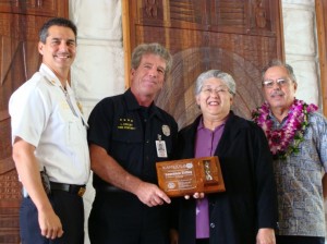 Photo from left to right:  Maui Fire Chief Jeffrey Murray, Firefighter I Lawrence "Larry" Crilley, Maui Mayor Charmaine Tavares, Maui Fire Commission Chair Butch Soares