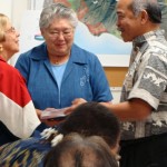 Budget Director Fred Pablo (right) and Maui Mayor Charmaine Tavares (middle) present Councilwoman Gladys Baisa (left) with her copy of the mayor's FY2010 budget.