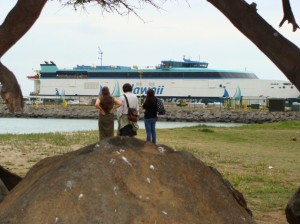 Maui News reporters interview Dot Buck (left) as the Superferry departs from Kahului Harbor.  The turnout for the departure was quiet in contrast to the demonstrations that greeted the vessel when it first launched service in the islands.