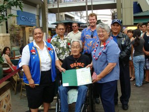 Maui Mayor Charmaine Tavares presents a proclamation to the VFW Buddy Poppies program for their work in "Honoring the Dead by Helping the Living."  Photo by Wendy Osher.