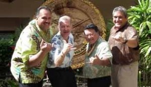 Kauai Mayor Bernard Carvalho, Jr., Honolulu Mayor Peter Carlisle, Maui Mayor-Elect Alan Arakawa, and Big Island Mayor Billy Kenoi flash the shaka during a recent meeting on Kauai. Courtesy Photo.
