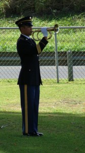 The Hawai'i Army National Guard Funeral Honors Team, playing Taps at the unveiling ceremony in honor of PFC Anthony T. Kaho'ohanohano. Photo by Wendy Osher.