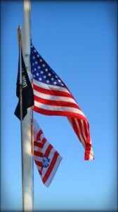 Flags at half-staff. File photo by Wendy Osher.