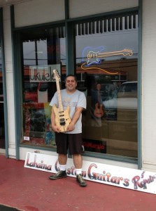 Avi Ronen, owner of Lahaina Custom Guitars & Repairs, in front of his new location, and home of K Avi Guitars. Courtesy photo.