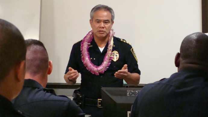 Maui Police Chief Gary Yabuta addresses graduates during a ceremony recognizing members of the department's new Crisis Intervention Team. Photo by Wendy Osher.