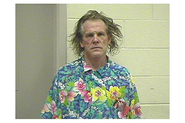 To the best of our knowledge Nick Nolte has never crashed through the ceiling of a police station, but we envision a similar photo might that ever occur.