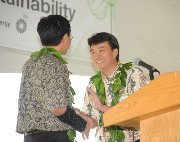 Kevin Sagara, vice president of Renewables and Corporate Development of Sempra US Gas & Power, welcomes Lt. Gov. Shan Tsutsui to the podium where he addressed a crowd of more than 200 attending Friday’s dedication of the Auwahi Wind facility at Ulupalakua Ranch.