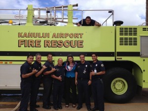 Rep. Tulsi Gabbard with firefighters from the Kahului Airport Fire Rescue. Courtesy photo.