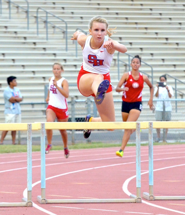 Seabury Hall's Christy Fell leads all qualifiers in the girls 300 hurdles and triple jump. Photo by Rodney S. Yap.
