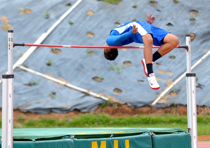 Maui High School's Vincent  Keomoungkhoune won the boys high jump Friday with fewer misses at 5 feet, 11 inches. Photo by Rodney S. Yap.