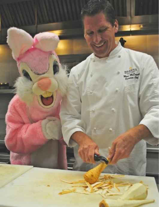 Makena Beach and Golf Resort's Executive Chef Marc McDowell's eyes belie fear as he attempts to remain calm and continue cooking  next to that freaky pink bunny. Courtesy photo.